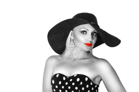 Black and White Fashion portrait of a woman , black hat and red lips.の写真素材