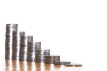 Stack of coins are in the order chart, economic backgroundの写真素材