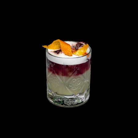 fresh alcohol coctail with fruits on the black backgroundの写真素材