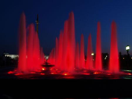 Red fountains are at nightの写真素材
