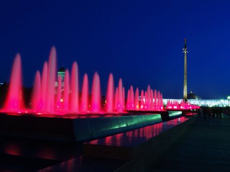 Red fountains are at nightの写真素材