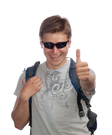 Young man with a rucksack and sun glassesの写真素材