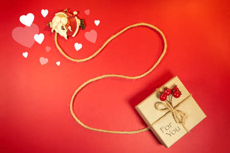 santa claus with hearts has a gift for you