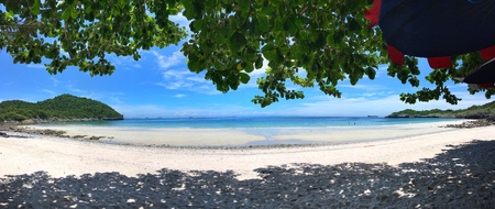 White sand long beach and blue sea. Panorama of viewpoint deep blue sea at 'Koh Si Chang' island, CHONBURI, THAILAND.の写真素材