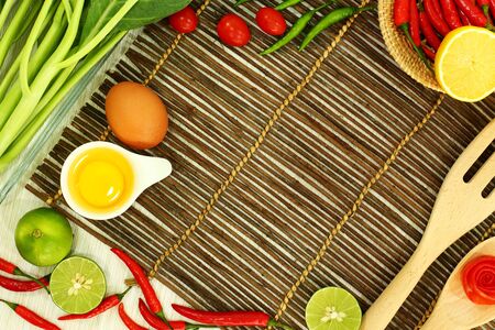 Flat lay out of mix vegetables and ingredients and free space for background ideas concept.の写真素材