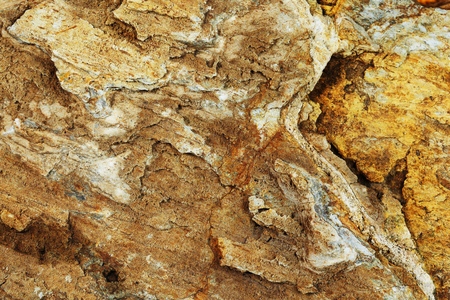 Texture of yellow stone for background. Close up texture stone in environment concept.の写真素材