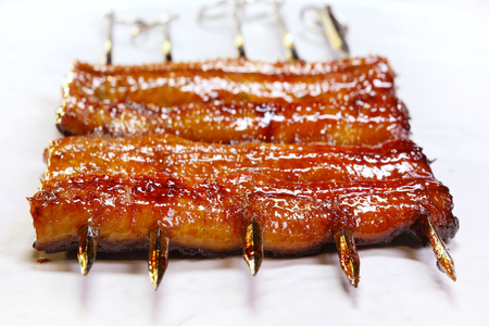 Grilled japanese eel on white background, Selective focus.の写真素材