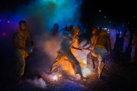 CHONBURI, THAILAND - SEPTEMBER 30, 2019: At night, The parade possessed by his god walking on fire...