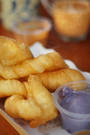 Deep fried doughstick, Chinese snack food served with boiled rice or soy milk or sweet milk or...