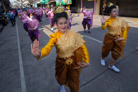 CHONBURI, THAILAND-APRIL 13,2022 : Beautiful parade Songkran Festival at Thailand. Foreign tourists and Thai people enjoy splashing water together with celebration carnival. Safe life, no coronavirus.のeditorial素材
