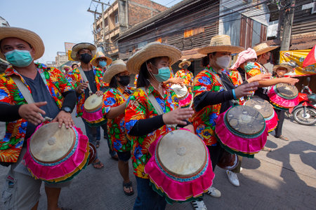 CHONBURI, THAILAND-APRIL 13,2022 : Beautiful parade Songkran Festival at Thailand. Foreign tourists and Thai people enjoy splashing water together with celebration carnival. Safe life, no coronavirus.のeditorial素材