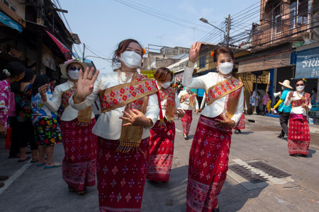 CHONBURI, THAILAND-APRIL 13,2022 : Beautiful parade Songkran Festival at Thailand. Foreign tourists and Thai people enjoy splashing water together with celebration carnival. Safe life, no coronavirus.のeditorial素材