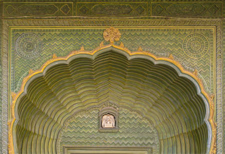 Green decorated top above door at Jaipur's Royal palace.のeditorial素材