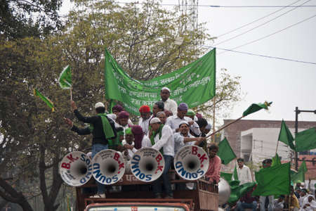 Agra in India - February 2011 - Truck loads of loud celebrating young Muslims in the streets.
