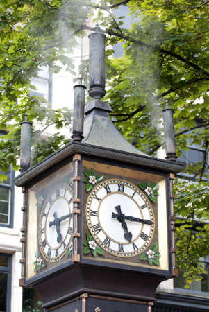 Historic clock blows steam.の写真素材