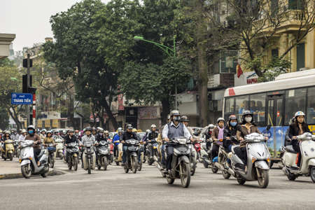 Vietnam Hanoi - March 2012: Overwhelming number of motorbikes downtown.のeditorial素材