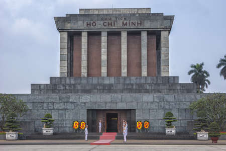 Vietnam Hanoi - March 2012: Close up of Ho Chi Minh mausoleum with guards and flowers.のeditorial素材