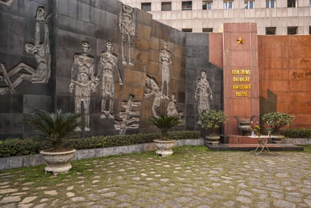 Vietnam Hanoi - March 2012: Memorial coutyard with sculptures in Hoa Lo Prison. Meditative area beautifully decorated with expressive sculptures.のeditorial素材