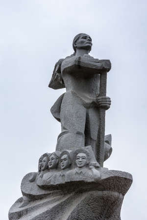 Vietnam Dong Hoi - statue of Me Suot Anh near the bay.