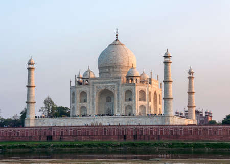 Light blue evening skies turn grey orange and light west side of monument.の写真素材