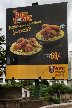 BENGALURU, INDIA - CIRCA OCTOBER 2013  Colorful billboard advertises the rice bowls served at Kentucky Fried Chicken restaurants のeditorial素材