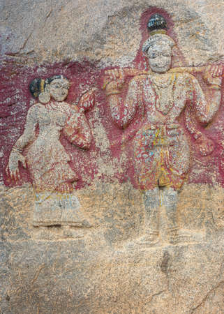 Millennium-old slab of rock with decoration at Sri Naheshwara in Bangalore  Worn off colors remain のeditorial素材