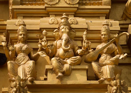 Lord Ganesha on the golden tower of the Sri Naheshware temple in Bengaluru のeditorial素材