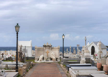 SAN JUAN, PUERTO RICO - MARCH 14, 2015: Central statue at the historic cemetery, located on the shore of the ocean near Castello San Felipe del Morro.の写真素材