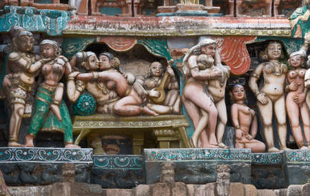 KUMBAKONAM, INDIA - OCTOBER 12, 2013: Sarangapani Vishnu Temple. Focus on Naked, pastel colored statues of human couples are making love or flirting in different positions. Most of the figures are naked. A small selection of the plus hundred figurines on のeditorial素材