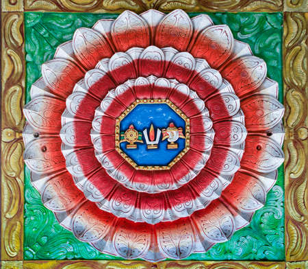 Trichy, India - October 15, 2013: Rosas, Mandala, lotus shaped painting on the ceiling of Anna Mandapam. The colors of the Indian flag with the symbols of Lord Vishnu in the center.のeditorial素材