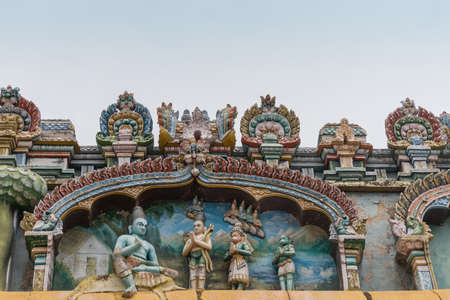 Trichy, India - October 15, 2013: Closeup of a statue scenery at Ranganathar Temple showing Lord Rama, the Lord Vishnu avatar, mapping the attack on Sri Lanka to liberate his wife Sita, in front of his brother Lakshman, with arrows, and Hanuman.のeditorial素材