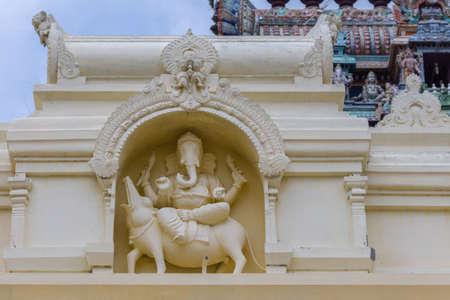 Tamil Nadu, India - October 18, 2013: Cream-colored Ganesha statue at Pillayarpatti Karpaga...