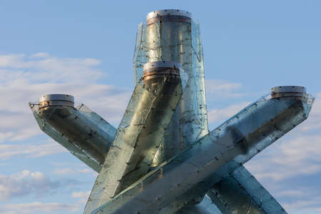 Vancouver, Canada - July 24, 2016: collection of giant glass-steel tubes form a contemporary art sculpture in front of the Convention Center. Color of skies affects color of statue.のeditorial素材