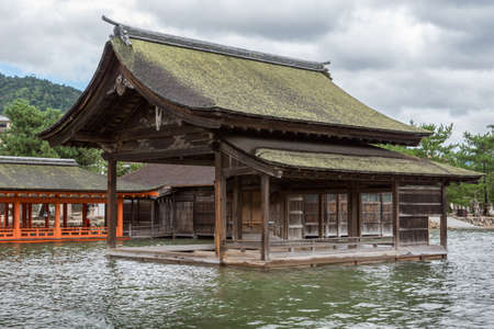 Hiroshima, Japan - September 20, 2016: Non Painted open hall of itsukushima Shinto Shrine on Miyajima Island built barely above sea level.のeditorial素材