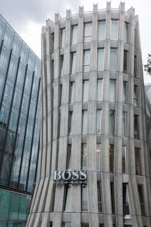 Tokyo, Japan - September 28, 2016: The iconic Hugo Boss store stands along the main road in the upscale neighborhood of Jingumae. Concrete and glass.のeditorial素材