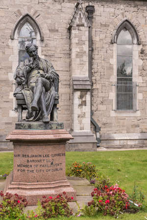 Dublin, Ireland - August 7, 2017: Sir Benjamin Lee Guinness Statue in garden of Saint Patrick...