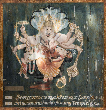Mysore, India - October 27, 2013: Eight-armed Vishnu as Narashima on wall painting outside...