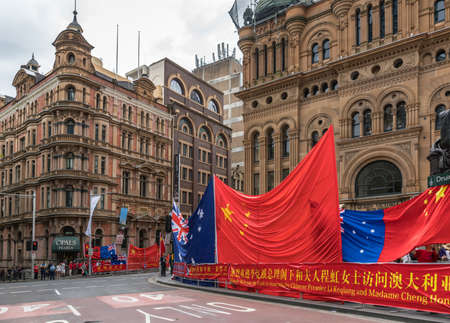 Sydney, Australia - March 25, 2017: Chinese living in Australia welcome Chinese Premier Li Keqiang in town with banners, giant flags and lots of noise at Druitt Street and corner of York Street.のeditorial素材
