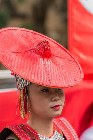 Sydney, Australia - March 25, 2017: Head shot of Chinese woman living in Australia welcomes Chinese Premier Li Kequing with traditional dances, songs and music. Public square side of Town Hall.のeditorial素材