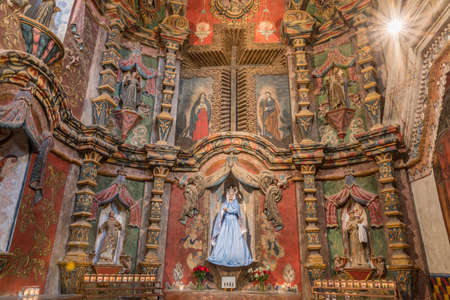 Tucson, Arizona, USA - January 9, 2018: East Transept reredos inside historic San Xavier Del Bac...