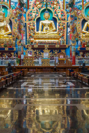 Coorg, India - October 29, 2013: Inside Padmasambhava Vihara of Namdroling Buddhist Monastery. The...