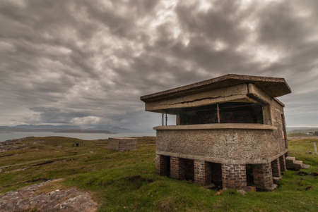 Inverasdale, Scotland - June 9, 2012: Ruins of brown Bunker at Cove Light Anti Aircraft Battery WW2...