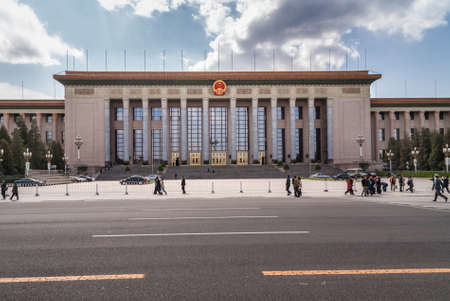 Beijing, China - April 27, 2010: Great Hall of the People on Tiananmen Square under blue sky with...