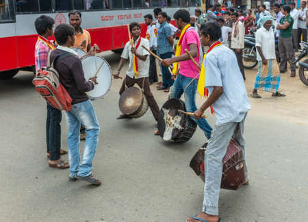 Mellahalli, Karnataka, India - November 1, 2013: Karnataka Rajyotsava Parade. Six male friends form...