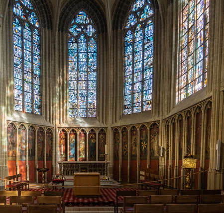 Kortrijk, Flanders, Belgium - September 17, 2018: Chancel of historic chapel in Notre Dame Church honoring all Dukes of Flanders through the ages. Stained glass windows and series of paintings.のeditorial素材