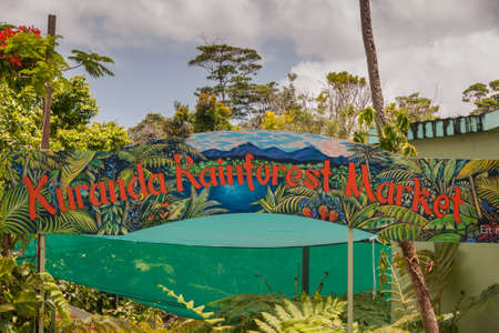 Kuranda, Queensland, Australia - December 4, 2009: Red Welcome sign of Kuranda Rainforest Market backed by green of the jungle.のeditorial素材