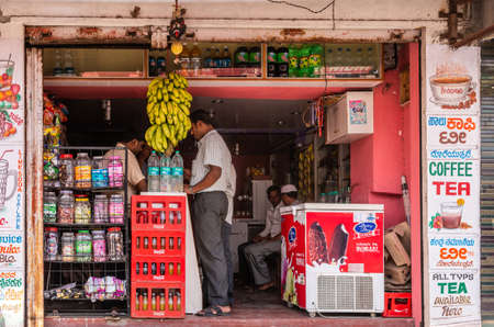 Belur, Karnataka, India - November 2, 2013: Closeup of small grocery store selling food and drink...