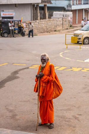 Belur, Karnataka, India - November 2, 2013: Chennakeshava Temple. Dark skinned Sadhu with white hair...