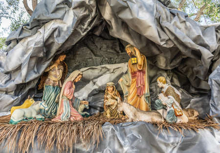 Garden Grove, California, USA - December 13, 2018: Crystal Christ Cathedral. Closeup of Statues in Nativity Scene for Christmas without baby Jesus but parents, animals and shepherds present.のeditorial素材