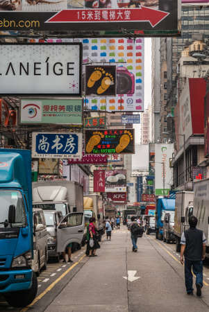 Hong Kong, China  - May 13, 2010: Kowloon mainland Section. Colorful commercial sign, print and lights, English, Mandarin and Kantonese, overkill off Nathan shopping street.のeditorial素材